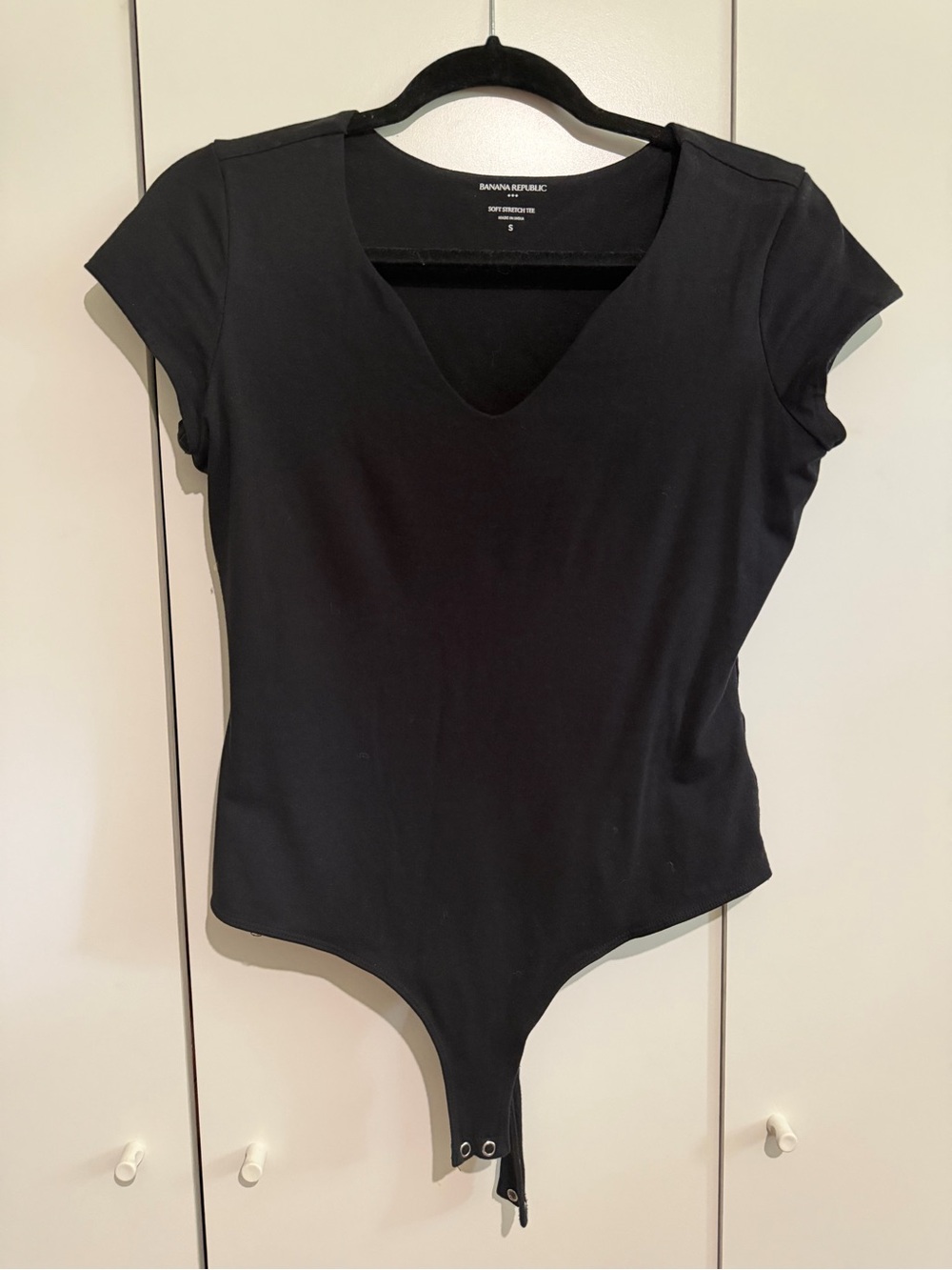 Banana Republic Black V-Neck Cap Sleeve Bodysuit with Snap Closure